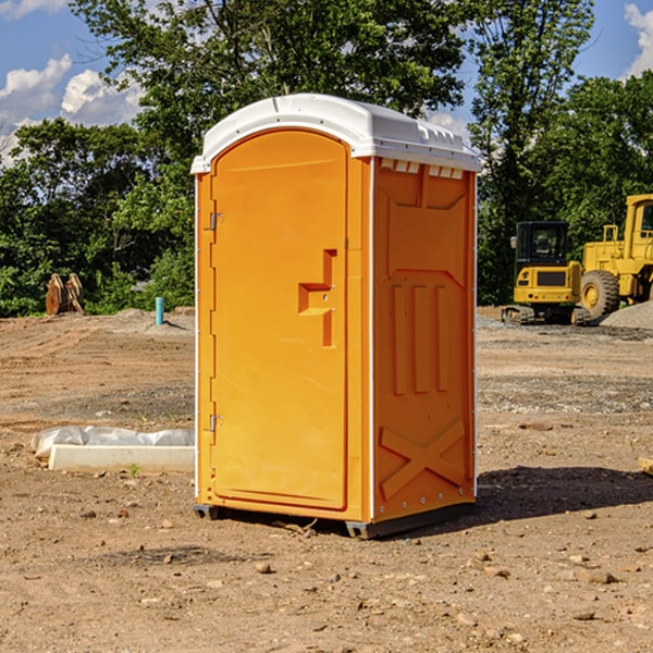 what is the cost difference between standard and deluxe portable restroom rentals in Bryant